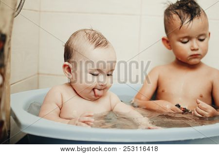 Children, Brother And Sister In The Bathroom