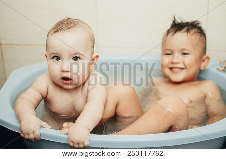 Children, Brother And Sister In The Bathroom