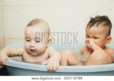 Children, Brother And Sister In The Bathroom