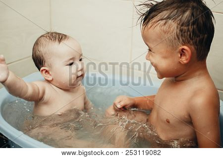 Children, Brother And Sister In The Bathroom