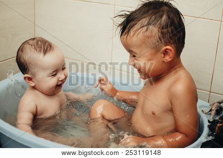 Children, Brother And Sister In The Bathroom