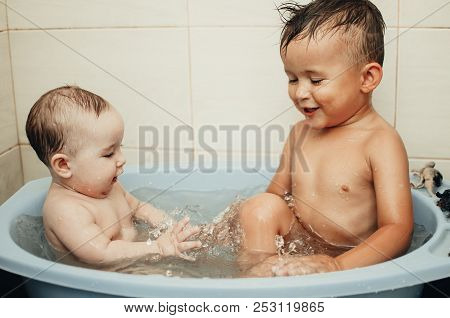 Children, Brother And Sister In The Bathroom