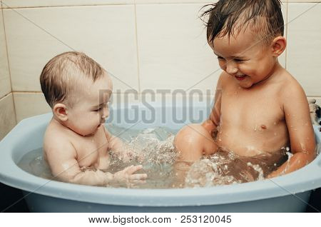 Children, Brother And Sister In The Bathroom
