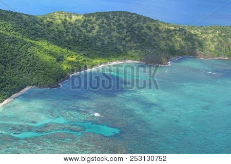 Aerial View Of Beautiful Coastline With Turquoise Blue Water And Green Vegetatioin Of Flamenco Penin