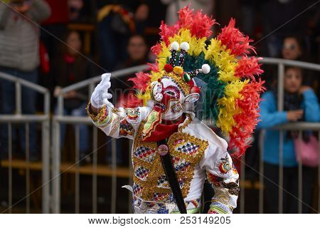 Oruro, Bolivia - February 25, 2017: Members Of A Waca Waca Dance Group In Ornate Costume Parade Thro