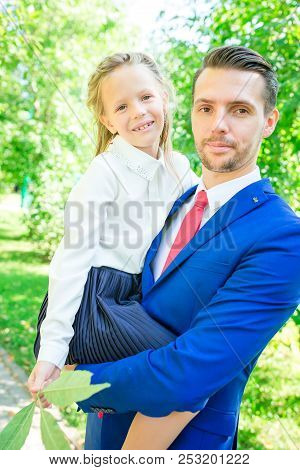 Father With Daughter To School. Adorable Little Girl Feeling Very Excited About Going Back To School