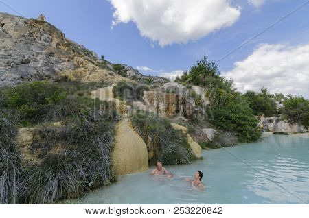 Bagno Vignoni - Italy - Circa 2014: People Enjoying A Natural Pool With Thermal Water In Bagno Vigno