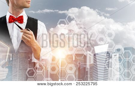 Double Exposure Of Confident And Young Businessman In Smart-casual Wear Smoking Pipe And Modern City