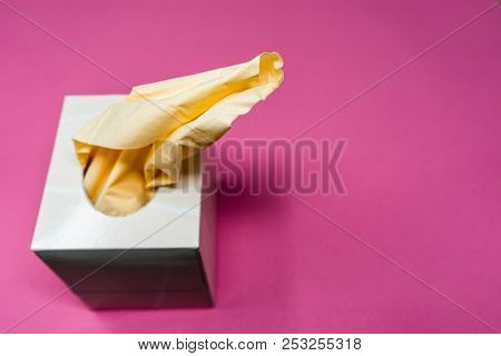 Facial Tissue Cube Box. Peach Colored Tissue Paper.