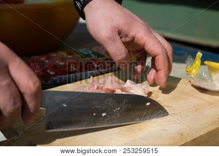 Raw Chicken Legs Prepared On A Wooden Board For Cooking