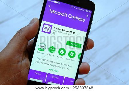 Bandar Seri Begawan,brunei - July 25th,2018 : A Male Hand Holding Smartphone With Microsoft Onenote 