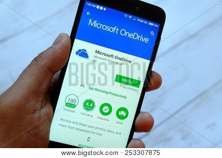 Bandar Seri Begawan,brunei - July 25th,2018 : A Male Hand Holding Smartphone With Microsoft Onedrive