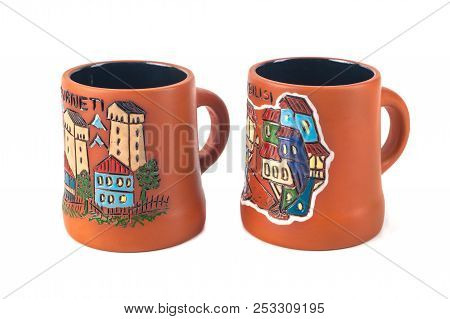 Georgian Clay Pottery With Traditional Ornaments On It. White Background