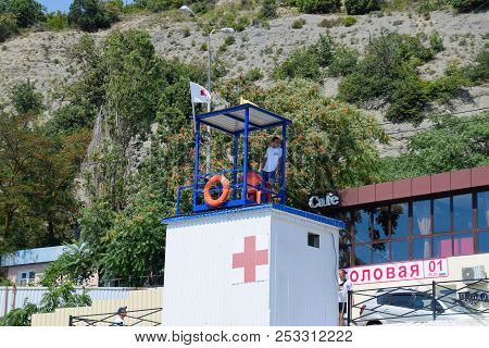 Novorossiysk, Russia - August 06, 2018: The Rescuer On The Rescue Tower Observes The Shore. Novoross