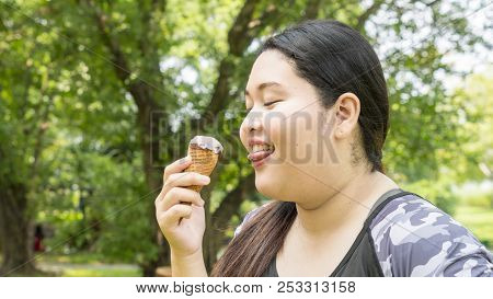 Fat Girl Eat Ice Cream In Close Up Face Feeling Delicious
