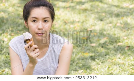 Cute Girl Eat Ice Cream In Close Up Face Feeling Delicious
