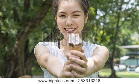 Cute Girl Take Out Ice Cream In Close Up Face Feeling Delicious