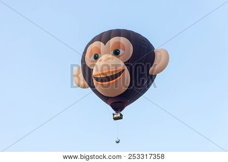 Afula, Israel, 3 August, 2018 : In The Sky Hot Air Balloon In The Shape Of Head Of A Monkey With Two