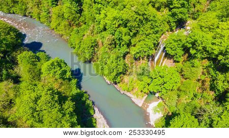 Drone View Of The Sochi River Gorge With Dense Forest And Orekhovsky Waterfall In Sunny Summer Day, 