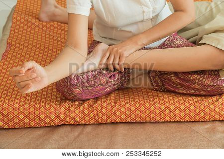 Focus Hand Massager Foot Reflexologist Thai Massage In Spa.concept Relaxation And Health Spa.