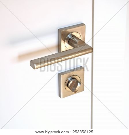 Door Integrated Lock, Consisting Of A Rotating Metal Handle And A Locking Device.