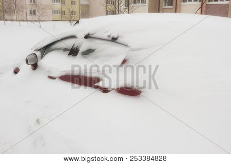 Red Car Under A Large Snowdrift, Snow Storm, Winter, Blizzard, Storm Warning, Drift