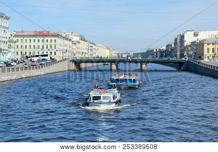 Saint Petersburg, Russia - May 1, 2017: Unknown Tourists Are On Excursion Boats On Fontanka River Ne