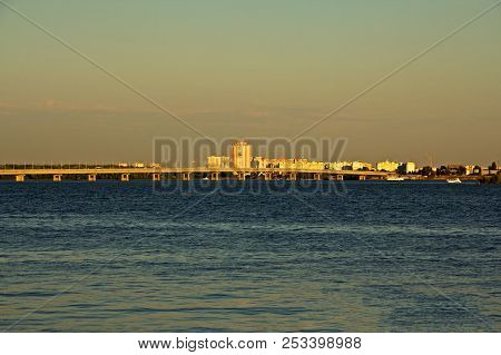 View Of Houses In Engels, Saratov Region And The Road Bridge Across The Volga River.