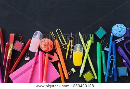 Colorful Office / School Supplies On A Black Background