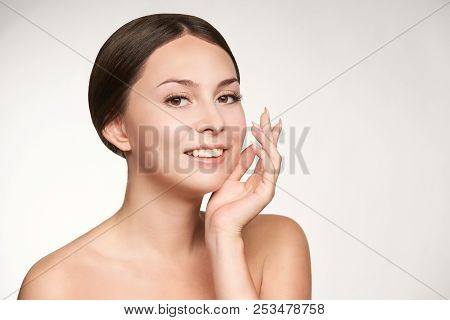 Young Girl Face With Hand. Nice Nail, Makeup. Spa Cosmetology