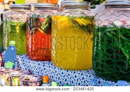 Assortment Of Bottles With Delicious Drinks Of Different Colors