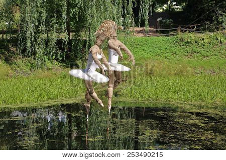 Ballerina Made Of Cloth Over The Water