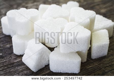 Sugar Cubes Figure On The Table Close Up