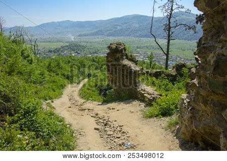 Ancient Ruins Of The Castle Of The Town Of Khust (dracula Castle). A Huge And Powerful Castle That P