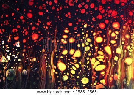 Abstract texture. Modern artwork background. Mixed black red and yellow pianting. Fluid Art. Unusual trendy background for poster, card, invitation. Contemporary art.
