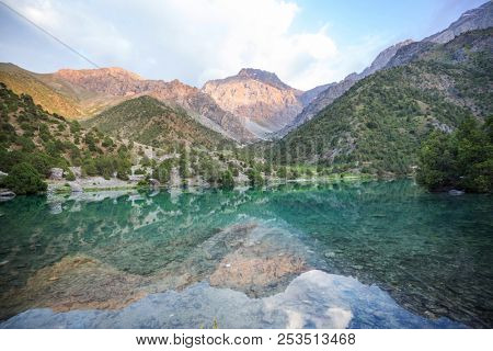 Beautiful serene lake in  Fann mountains (branch of Pamir) in Tajikistan.