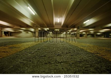 Urban parking garage at night.