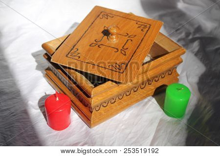 Beautiful Wooden Box With Present Iside Decorated Two Bright Candles