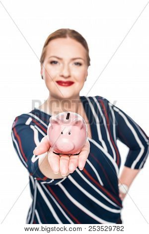 Selective Focus Of Businesswoman Showing Pink Piggy Bank Isolated On White Background