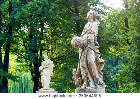 Sandstone Statues In The Saxon Garden, Warsaw, Poland. Made Before 1745 By Anonymous Warsaw Sculptor
