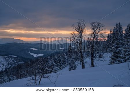 Winter Landscape Of A Mountain Range In Winter. Sunset In The Mountains. Winter Vaction In The Mount