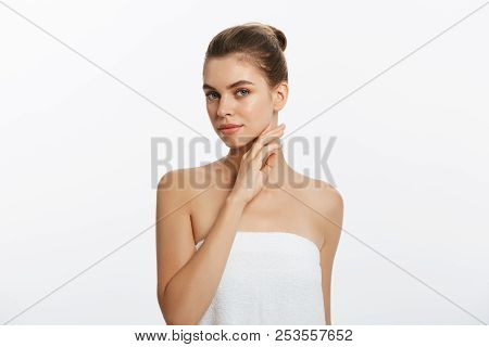 Happy Beautiful Girl Holding Her Cheeks With A Laugh Looking To The Side. Expressive Facial Expressi