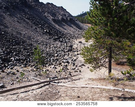 Textured Obsidian And Hardened Lava Rock On A Sunny Fall Day At The Big Obsidian Flow In The Newberr