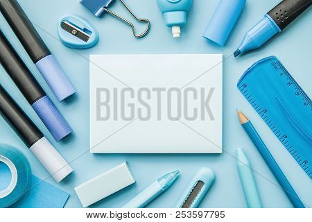School Supplies Of Blue Color On A Blue Background. Male Or Boyish Still Life On The Topic Of School
