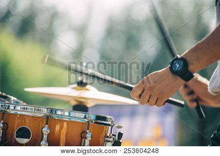 Wooden Chopsticks Are Held Firmly In Hand.