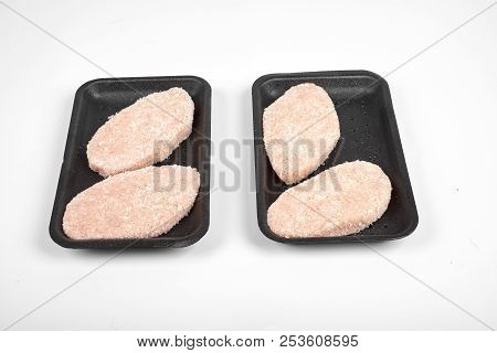 Raw Delicious Chicken Cutlet In Package. Isolated On A White Background.