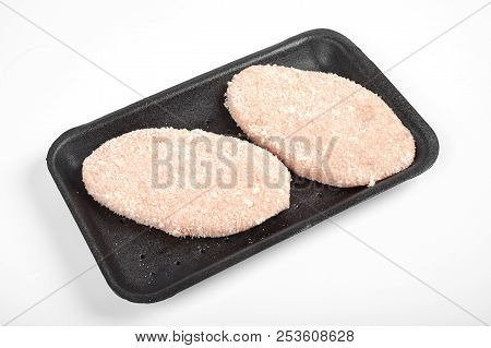 Raw Delicious Chicken Cutlet In Package. Isolated On A White Background.