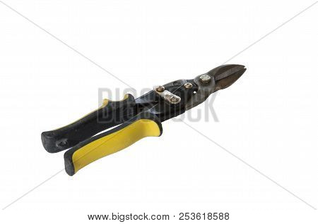 Tool Tinsmith. Scissors On Metal And A Metal Ruler.
