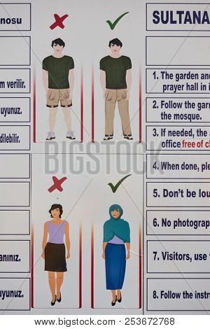 Istanbul, Turkey - July 16, 2018: Sultanahmet mosque (Blue mosque) information board  - Garment regulations