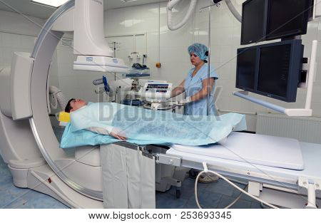 MOSCOW, RUSSIA - November 09, 2012: The patient before the operation on an x-ray machine. The endovascular surgery room in the city clinical hospital in Moscow.